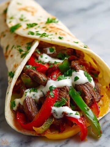 Sizzling Steak Fajitas with Colorful Bell Peppers and Onions Recipe