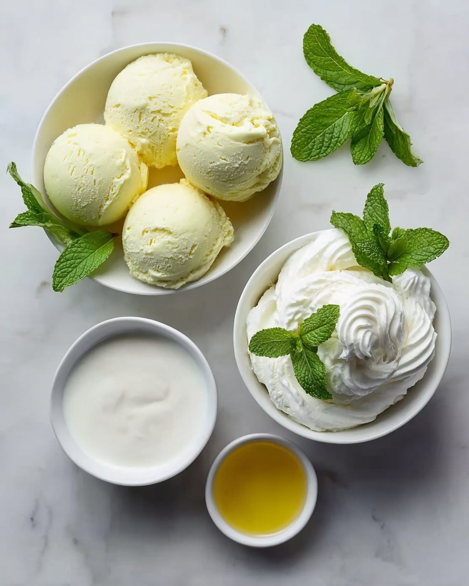 The image shows four white bowls on a white marbled surface. The largest bowl contains four round, pale yellow scoops of ice cream with a smooth creamy texture and a fresh green mint sprig on the side. Beside it, a medium bowl is filled with white whipped cream swirled in soft peaks, also decorated with a green mint sprig. Below, a smaller white bowl holds a smooth layer of white milk or cream. Next to it, the smallest bowl contains a small amount of golden yellow liquid, possibly oil or syrup. The arrangement is neat and clean, highlighting the fresh and smooth textures of the ingredients. photo taken with an iphone --ar 4:5 --v 7