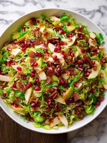 Shredded Brussels Sprout Salad with Pomegranate, Apple, Bacon, and Feta Recipe